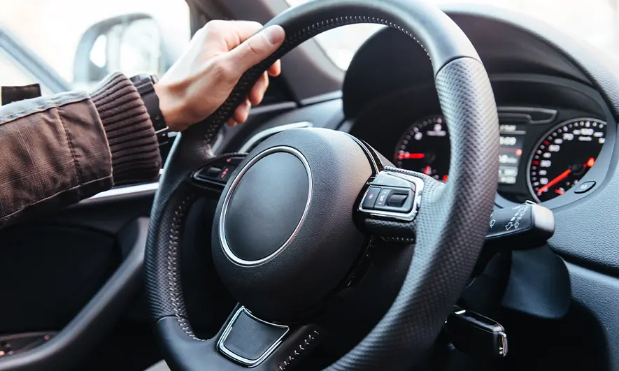 hand on wheel