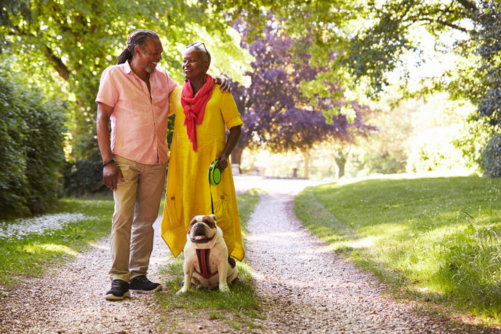 couple on walk with dog