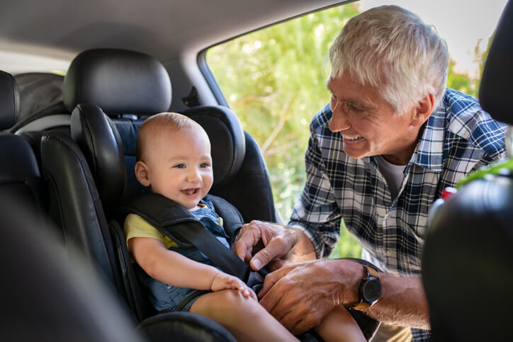 grandfather and grandson in car