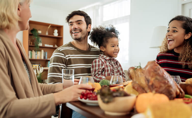 A family chatting over a holiday meal