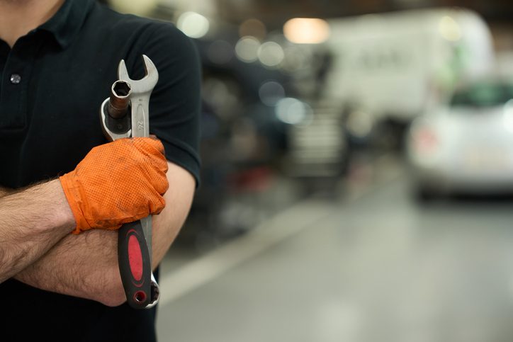 Mechanic holding a wrench