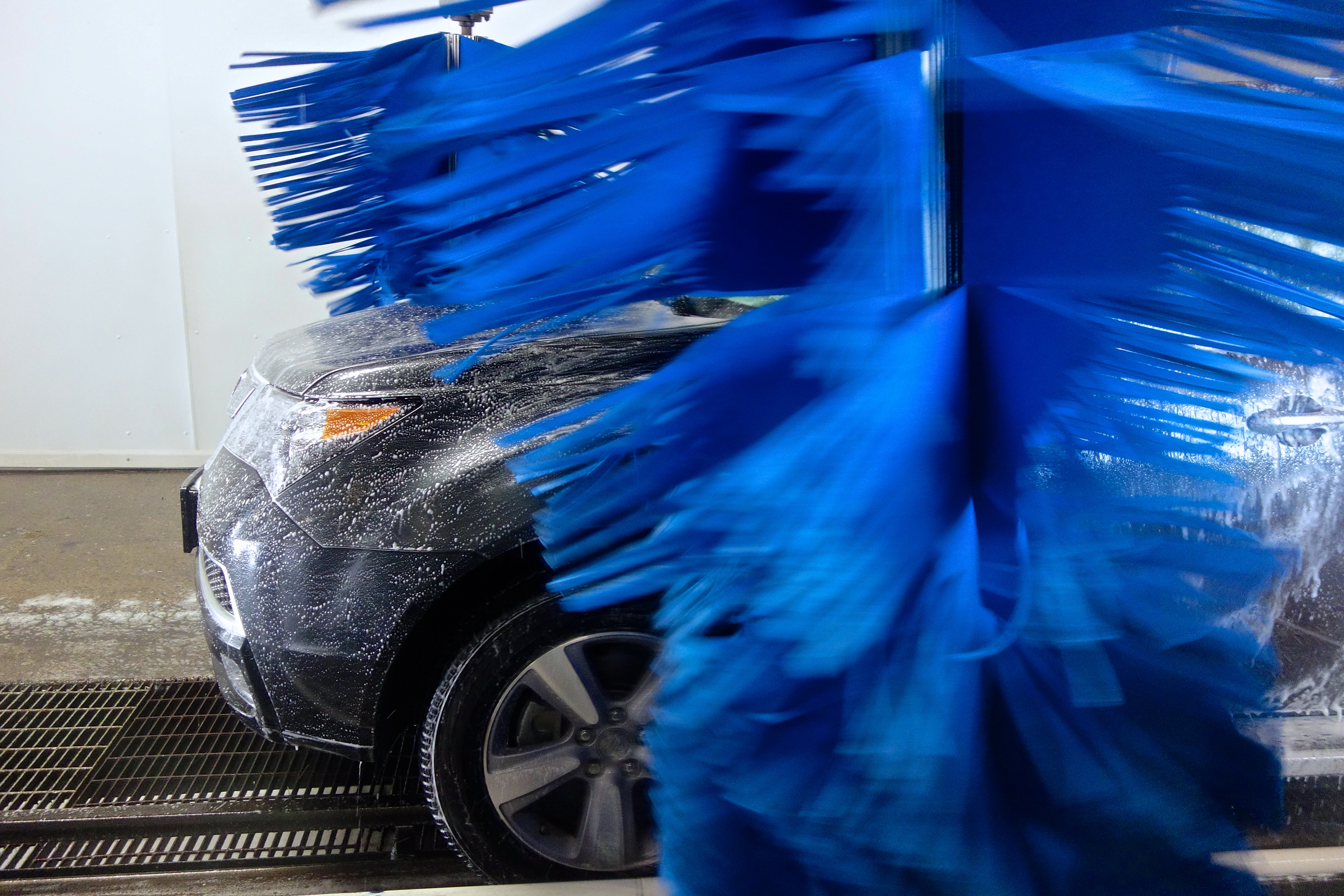 Car in a drive through car wash