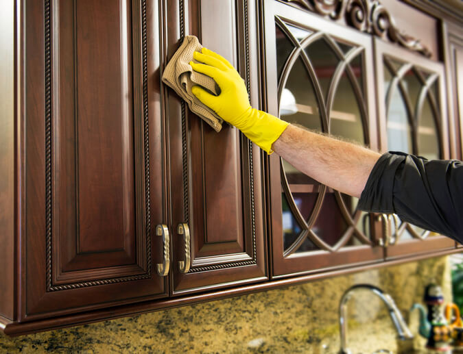 wiping cabinets