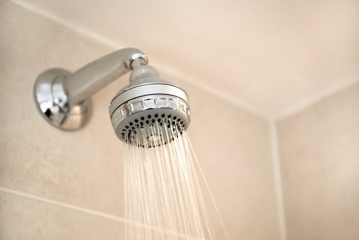A shower head running