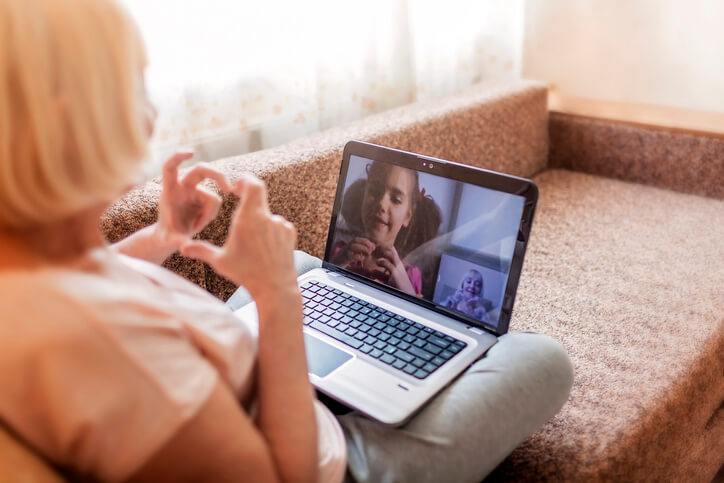 grandmother and grandaughter computer video chat