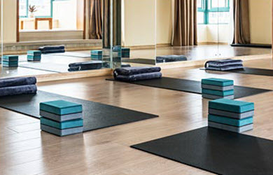 An empty yoga studio protected by yoga insurance