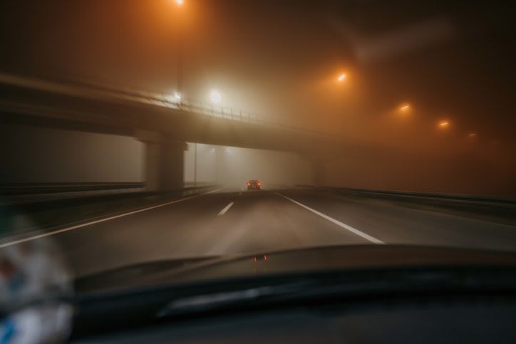 foggy highway at night