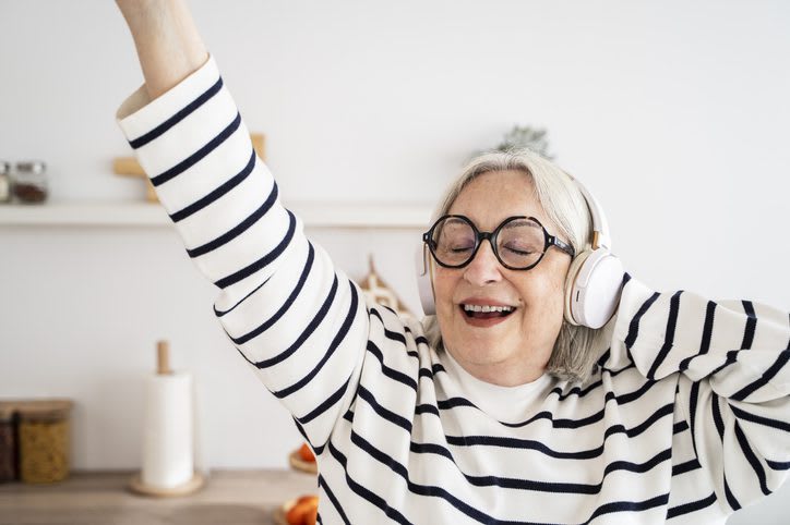 woman listening to music on headphones