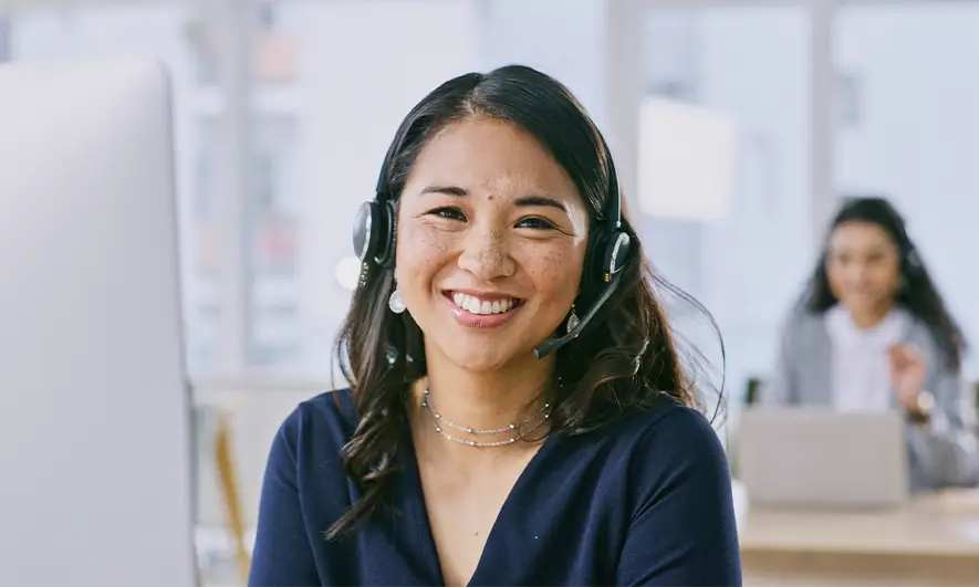 female customer service worker happy to provide AARP Membership Benefits