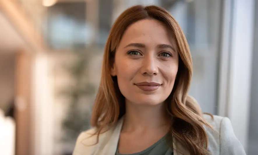 Woman smiling and making eye contact