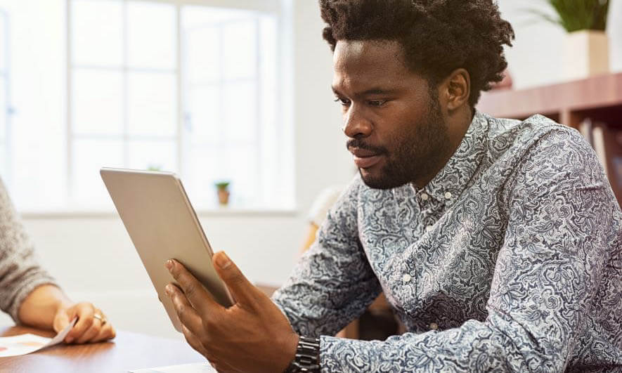 Man Researching Educational Resources
