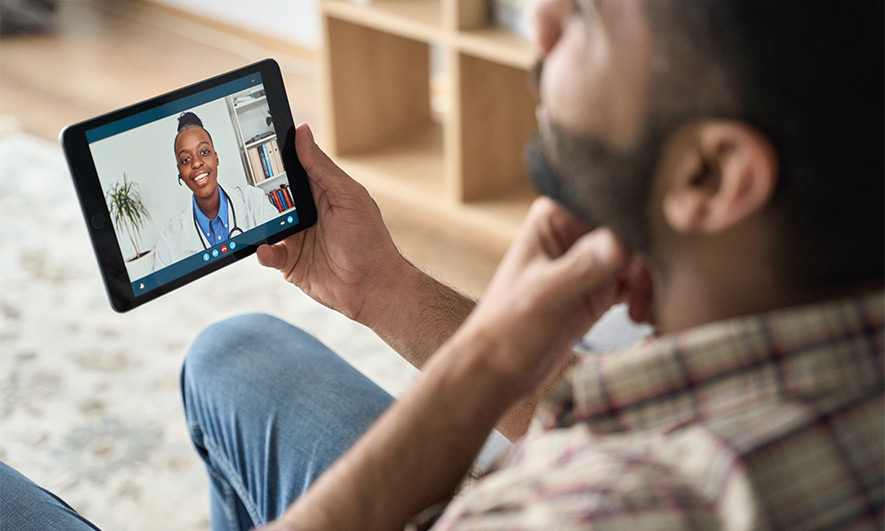 A patient has a telehealth visit on their tablet