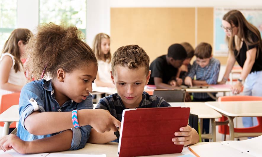 Donating school supplies to students