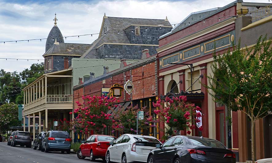 business owner feeling happy knowing What Is Mixed-Use Property Insurance