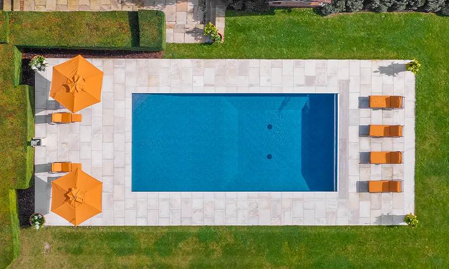 Aerial view of a rectangular pool and deck