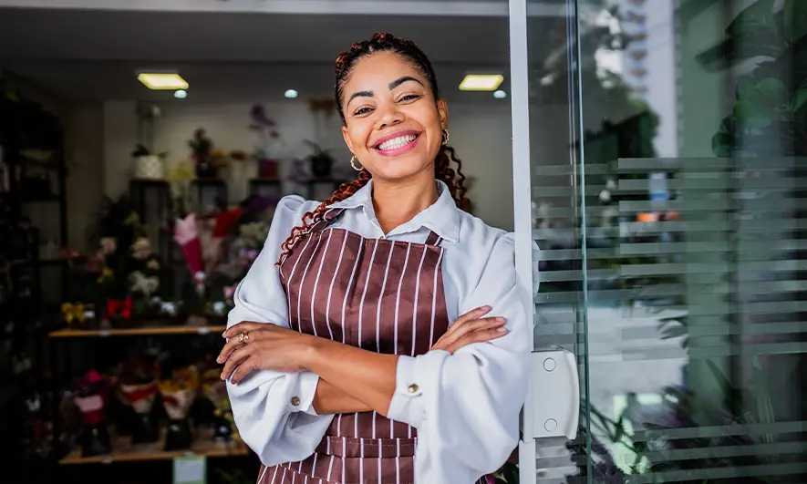 A business owner pleased with their employee benefits coverage