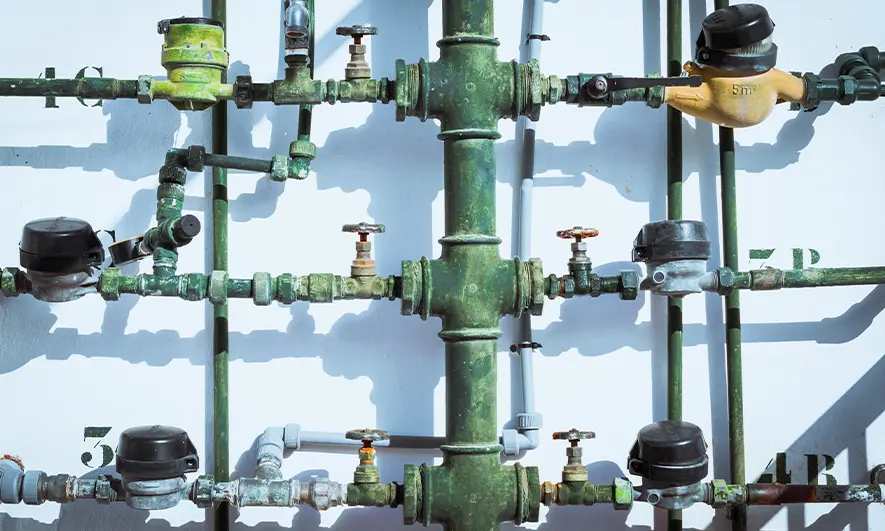 Connected water meters and valves installed on an exterior pipe system