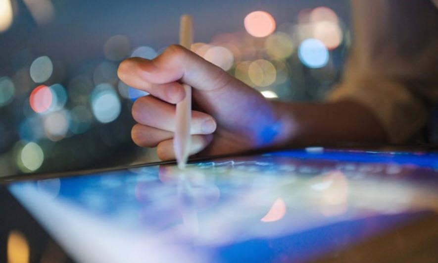 Someone using a tablet for monitoring