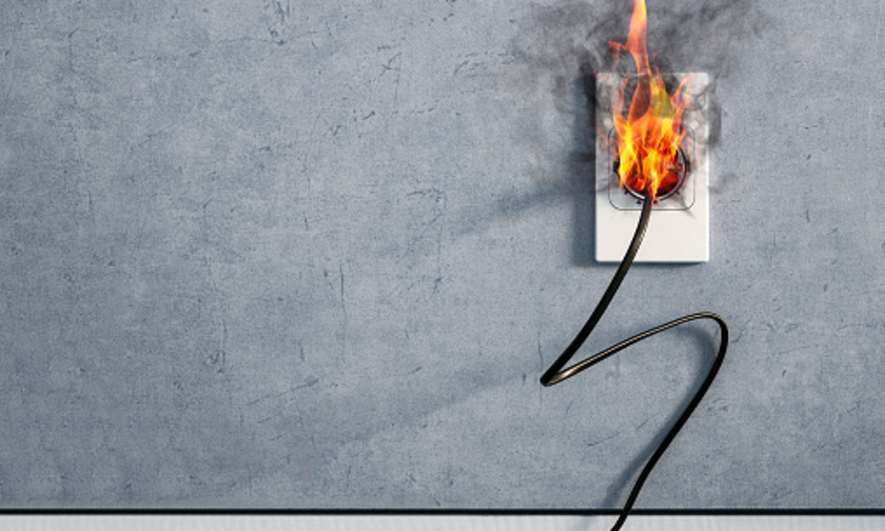 Fire coming out of an electrical outlet