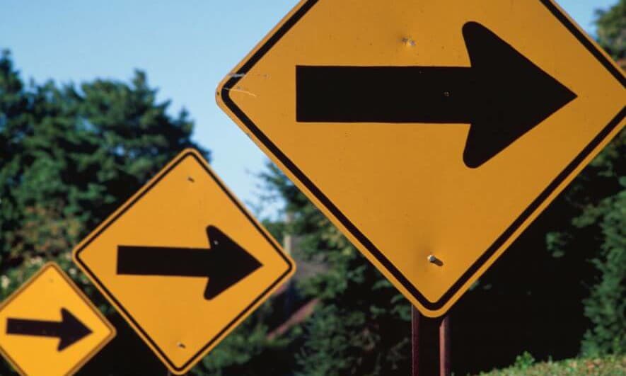 road signs with blue sky