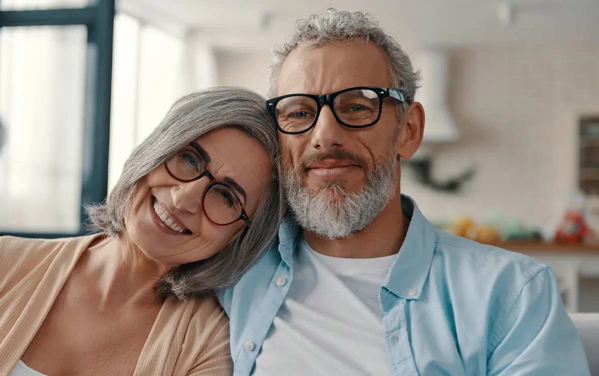 Homeowners in their house protected by aarp homeowners insurance