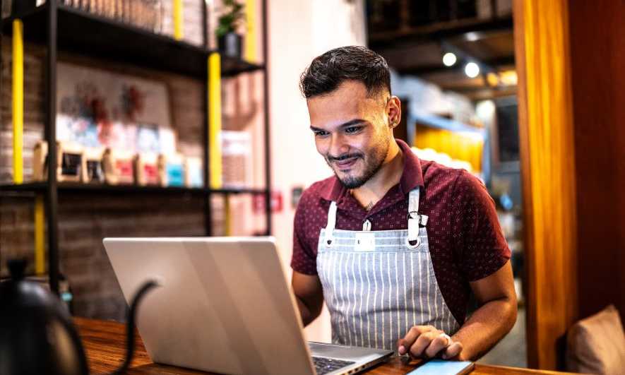 small business owner utilizing AI tools for marketing