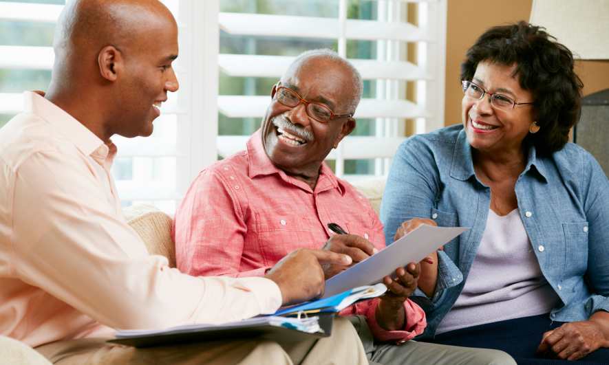 advisor helping couple with trust