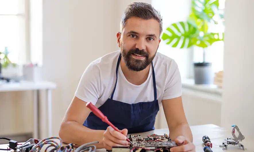 business owner protected by appliance repair business insurance