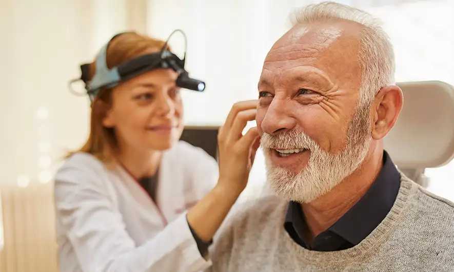 small business owner knows she's protected by audiologist insurance