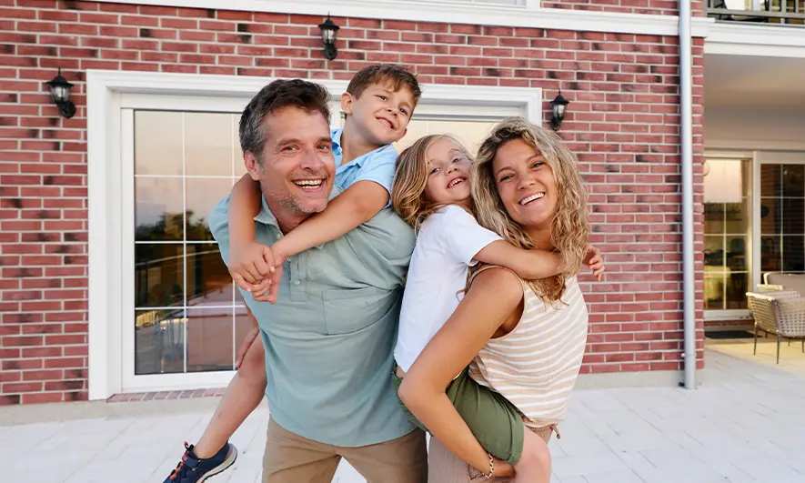 A smiling family of four