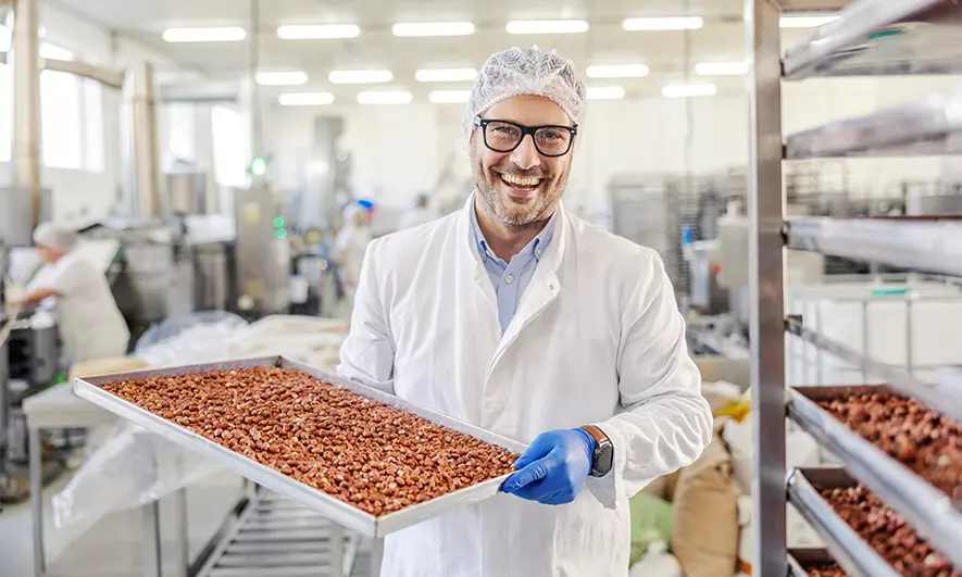 male small business owner protected by food manufacturing insurance
