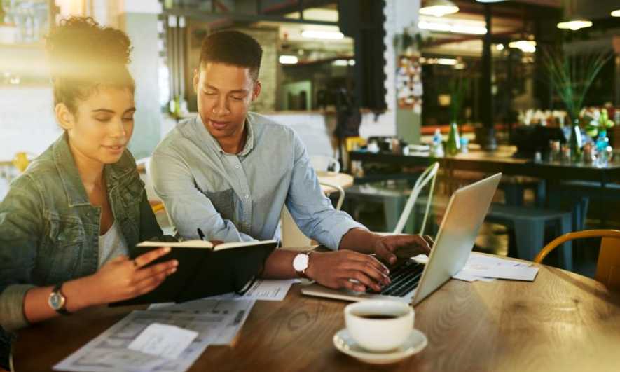 small business owners discuss plans to manage their business debt