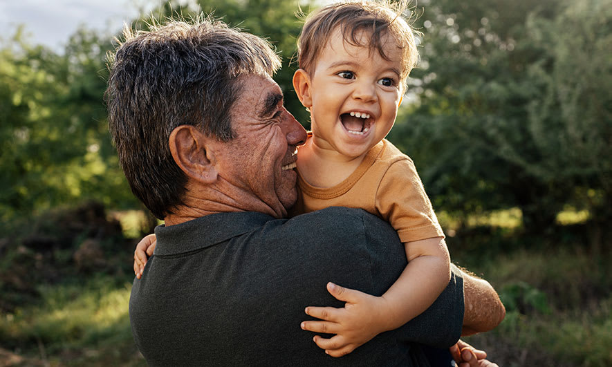 dad carrying son
