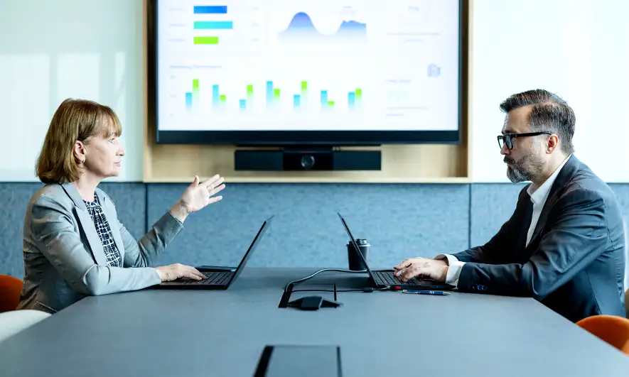 two people discussing Financial Services insurance