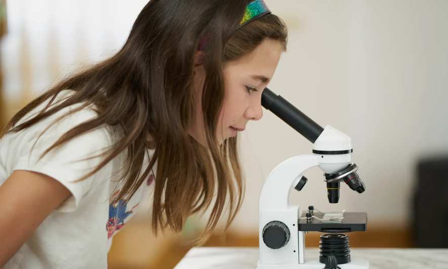 A woman standing in a lab