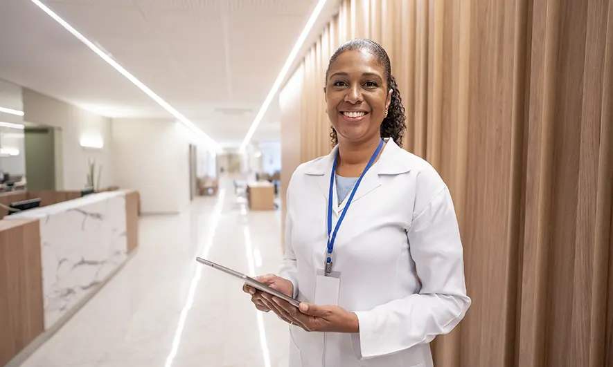 female business owner protected by insurance for surgeons