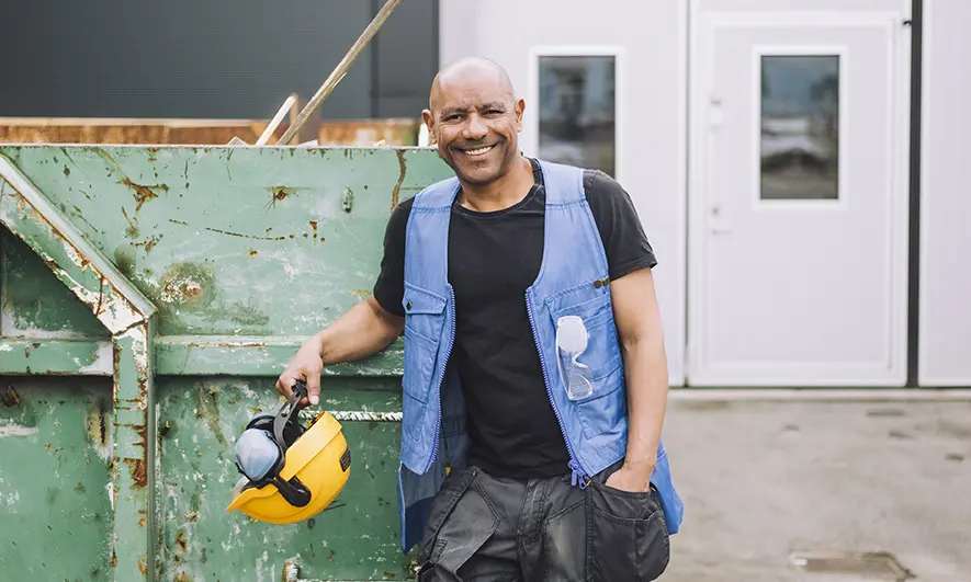 business owner protected by junk removal insurance