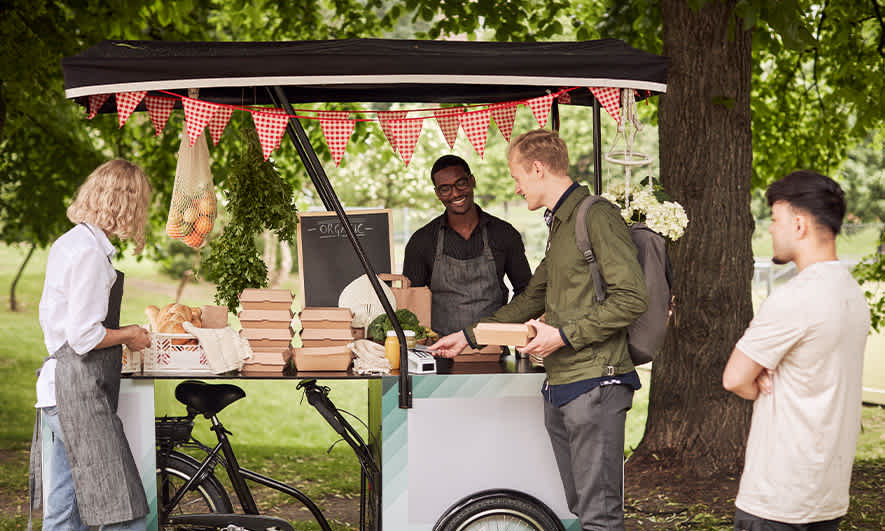 small business owners feeling secure knowing they're covered by food cart insurance