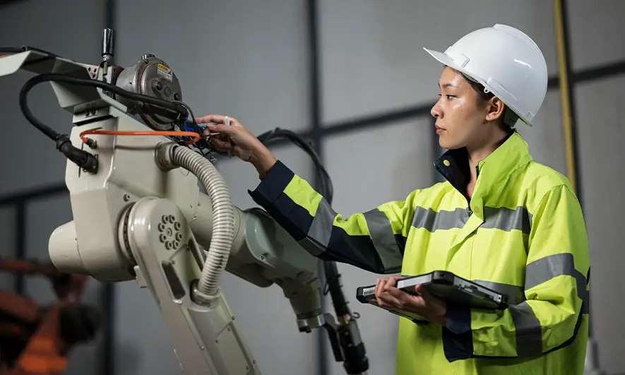  Inspector reviewing documentation or audit process in a manufacturing or lab setting