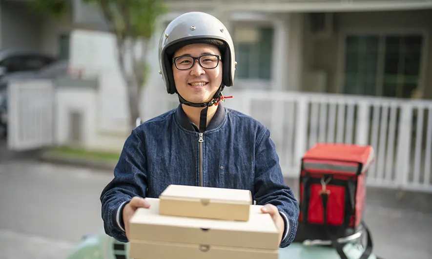 business owner protected by motorcycle courier insurance