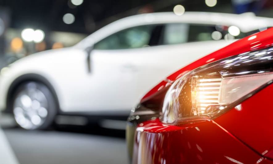 The front of a shiny new car