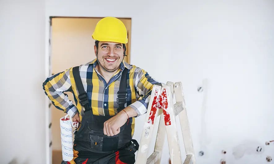 business owner protected by plasterers insurance