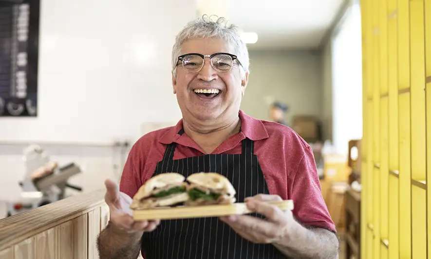 business owner protected by sandwich shop insurance