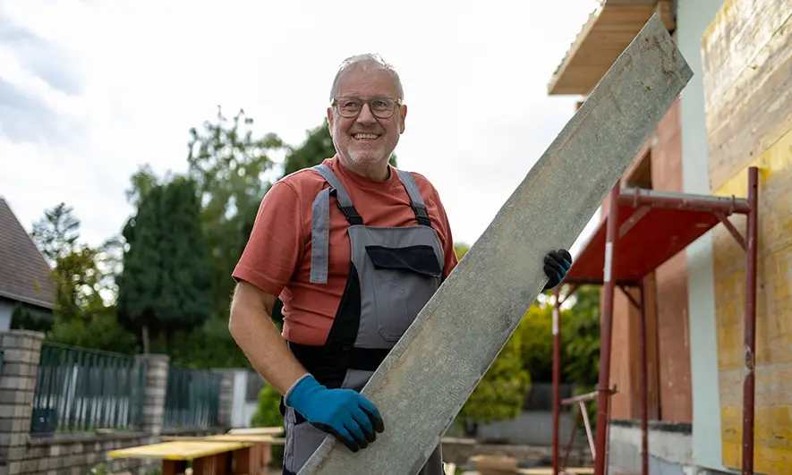 business owner protected by siding installation insurance