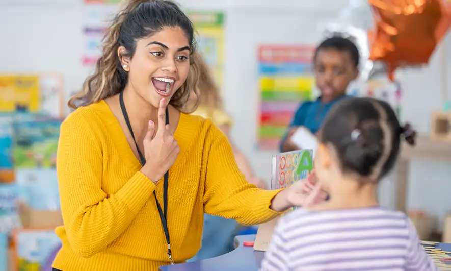 business owner happily protected by SLP insurance