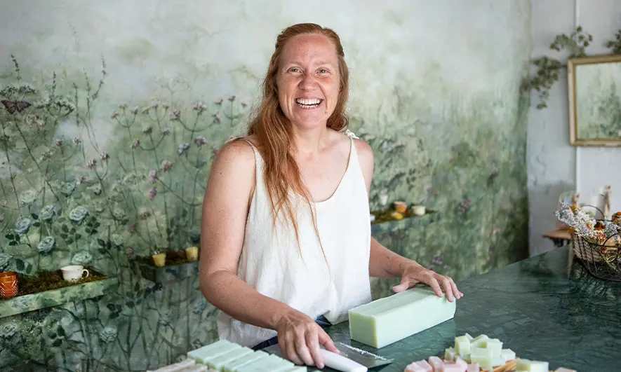 business owner protected by soap makers insurance