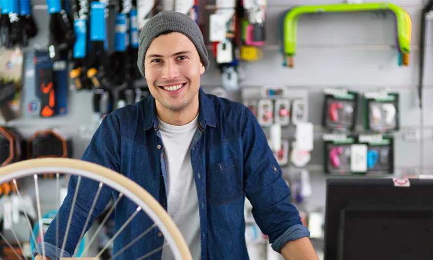 male business owner protected by sporting goods store insurance