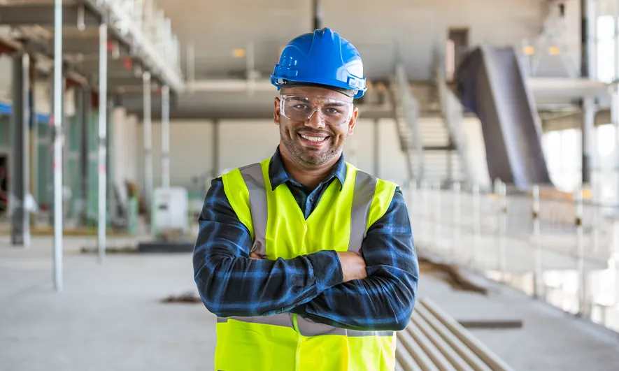 Man in a hard hat at a construction site
