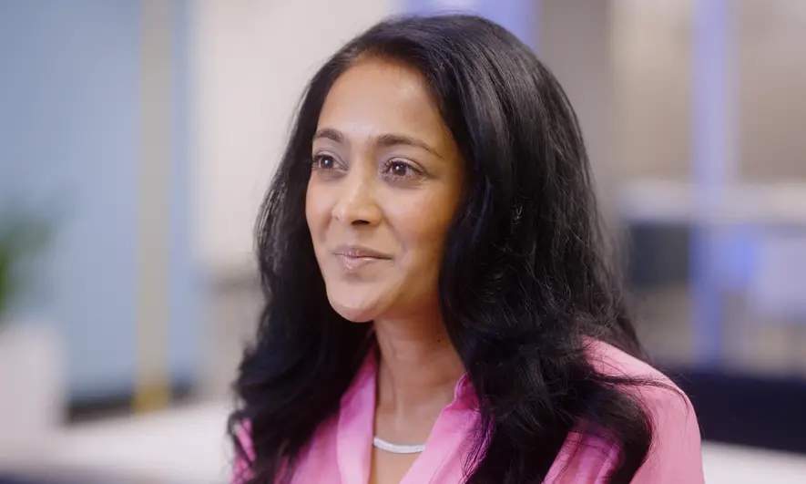 A woman dressed in business clothes