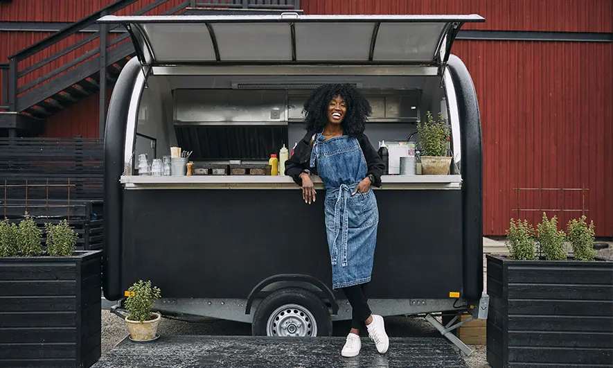 female business owner protected by vendor event insurance